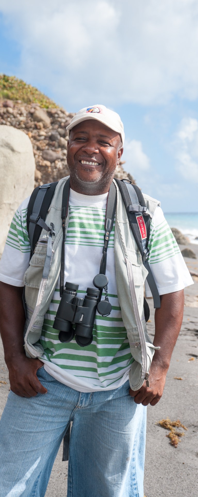 James 'Scriber' Daley smiling in the Montserrat rainforest