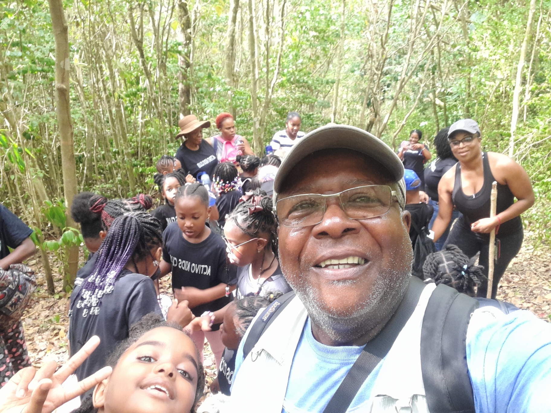 Scriber selfie with kids on the rainforest trail